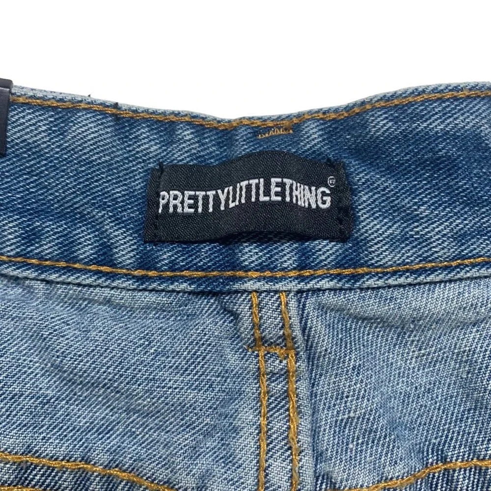 PrettyLittleThing | Women | Light Wash Extreme Distressed Mom Jeans | Size 29